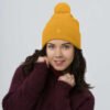 pom-pom-knit-cap-gold-front-693be9744dbcd.jpg Enigmina